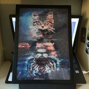 Completed framed diamond art, glue sealant added Kitten and tiger